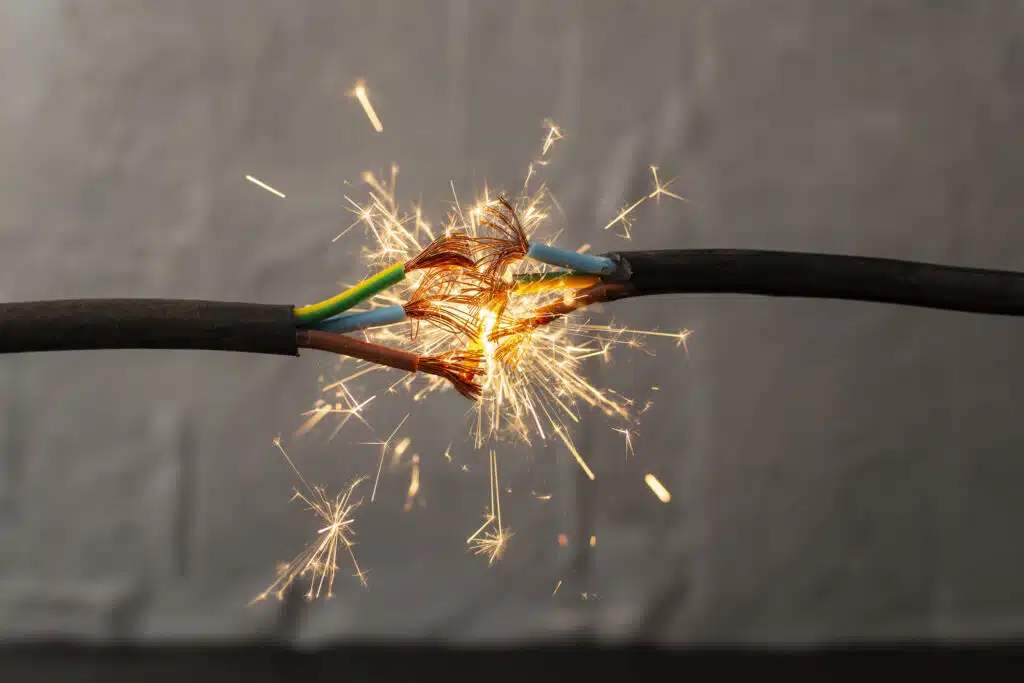 Sparks explosion between electrical cables, fire hazard concept, Electrical Mistakes.