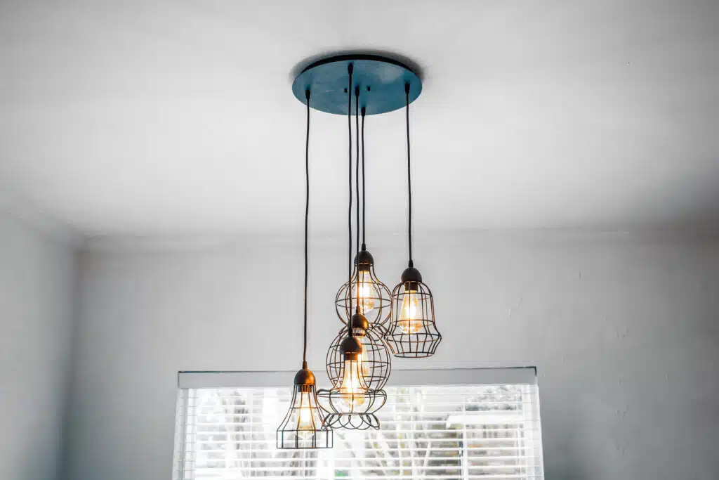 Industrial style metal and glass hanging pendant light in eat in kitchen, Lighting Fixtures.