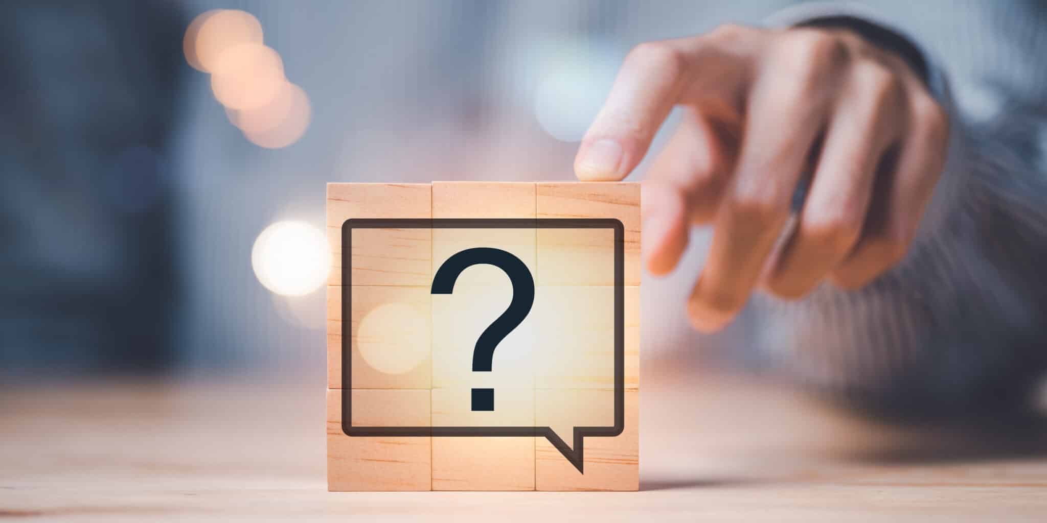 Question mark on wooden block, Backup Power Solutions.